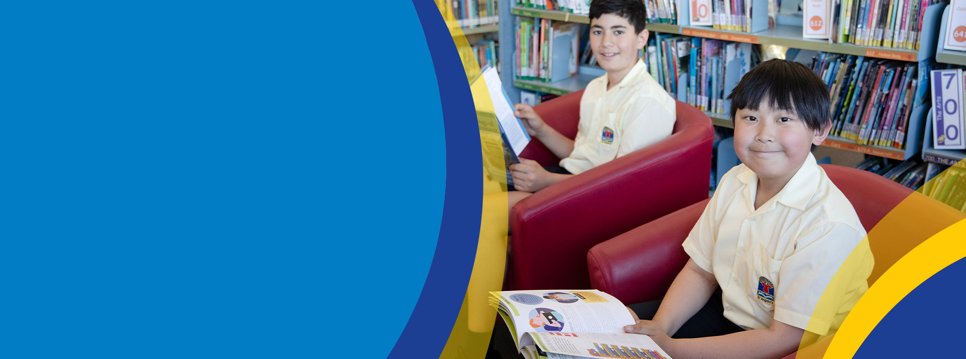 Students reading together in the library at St Angela's Primary School Castle Hill