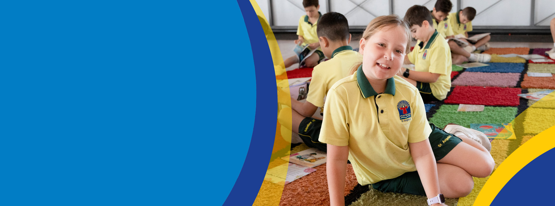 Student smiling in the classroom at St Angela's Primary School Castle Hill