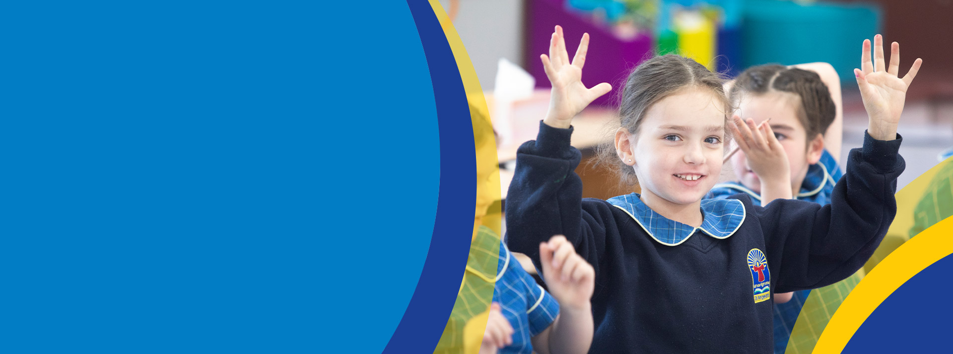 Student holding her hands up in the classroom at St Angela's Primary School Castle Hill