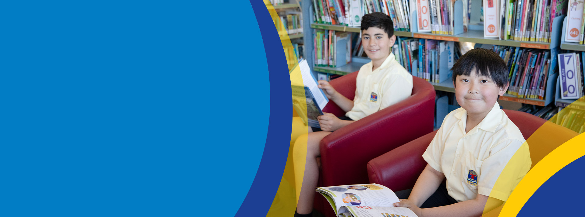 Students reading books together in the library at St Angela's Primary School Castle Hill