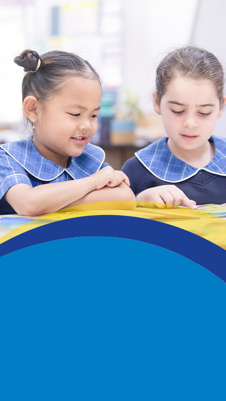 Students learning together in the classroom at St Angela's Primary School Castle Hill