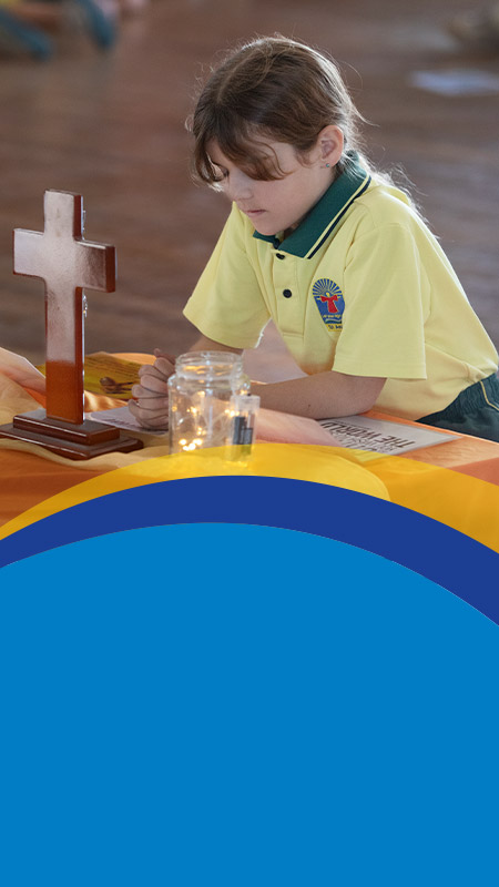 Student sitting in the prayer space in the classroom at St Angela's Primary School Castle Hill