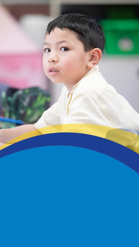 Student learning in the classroom at St Angela's Primary School Castle Hill