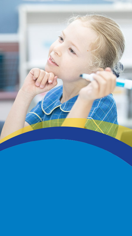 Student learning in the classroom at St Angela's Primary School Castle Hill